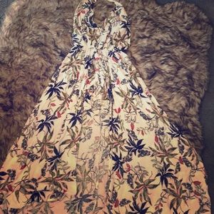 A jumpsuit with a long skirt attached to the back